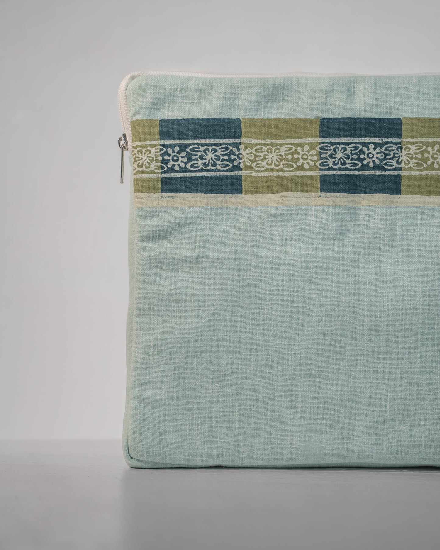 Blue-green laptop sleeve