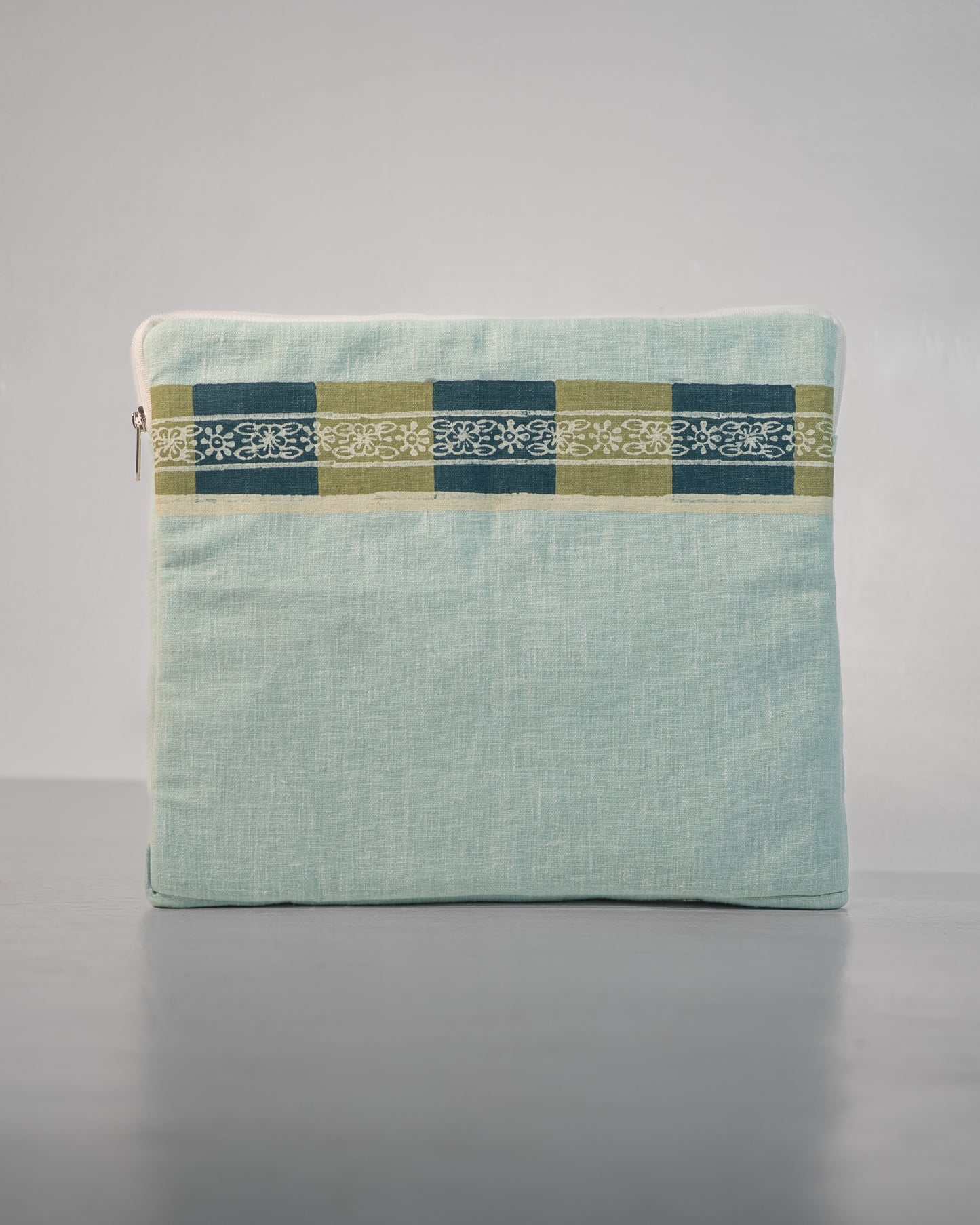 Blue-green laptop sleeve